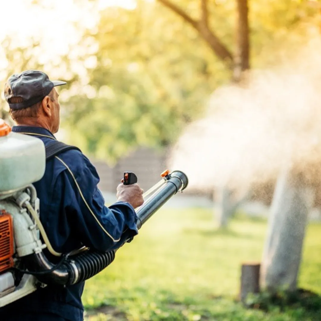 Technician Spraying 