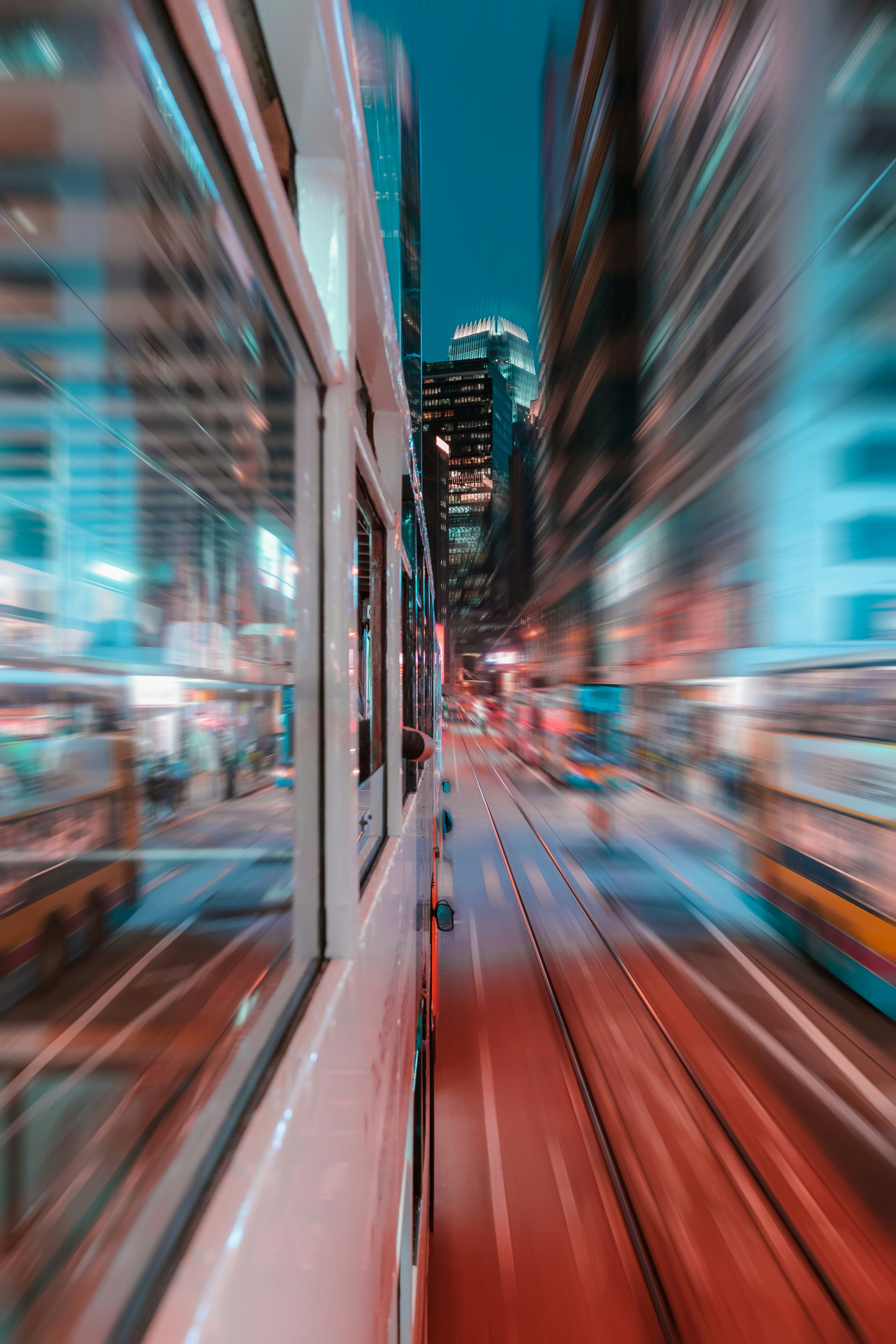 Image of a tram in Hong Kong, depicting the forward motion, the autopilot that we all have been operating under in the first half of our lives. 