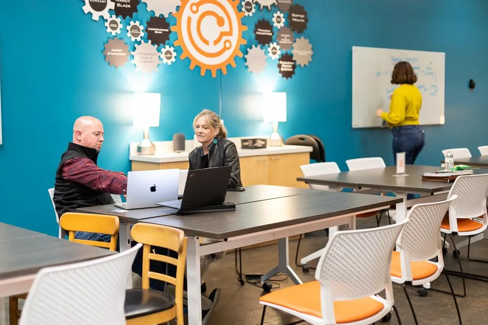entrepreneurs working in a coworking space