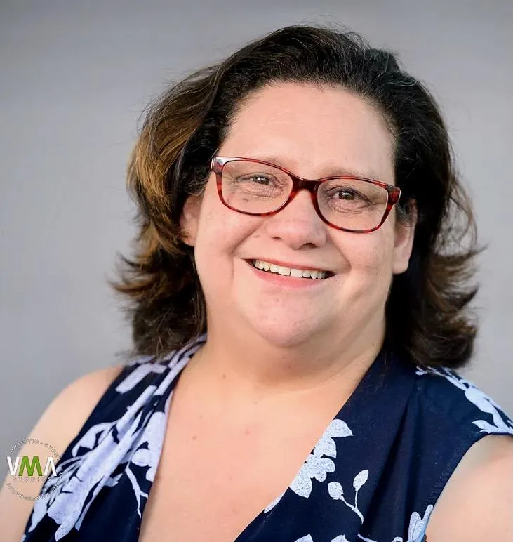 a couple of beds sitting inside of a train car