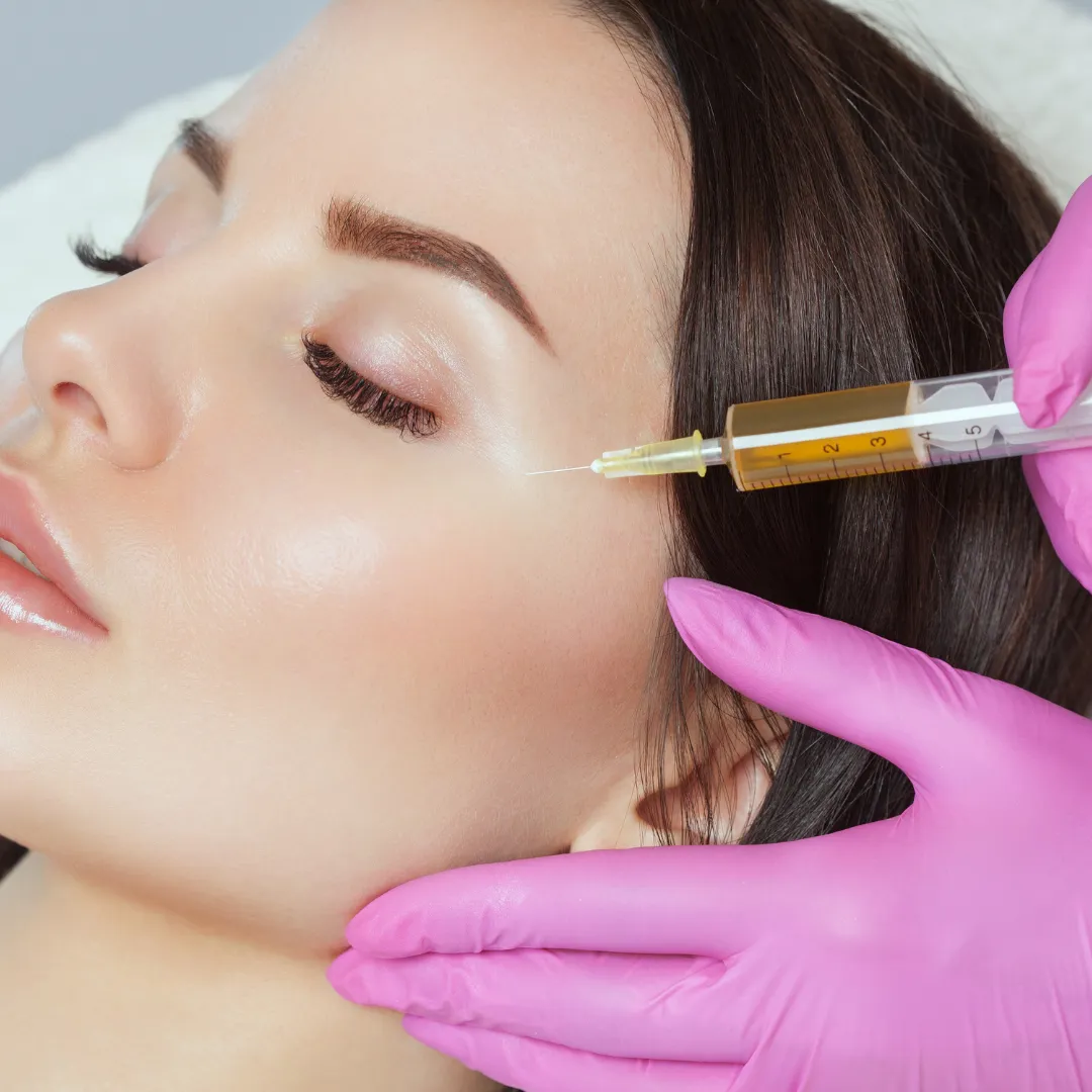 woman getting injected with her own blood for a PRP treatment