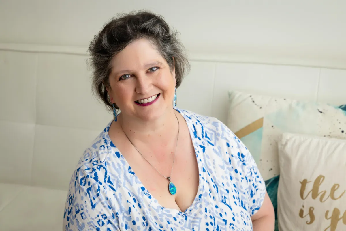 Simplify Your Tech Kat Milner on phone