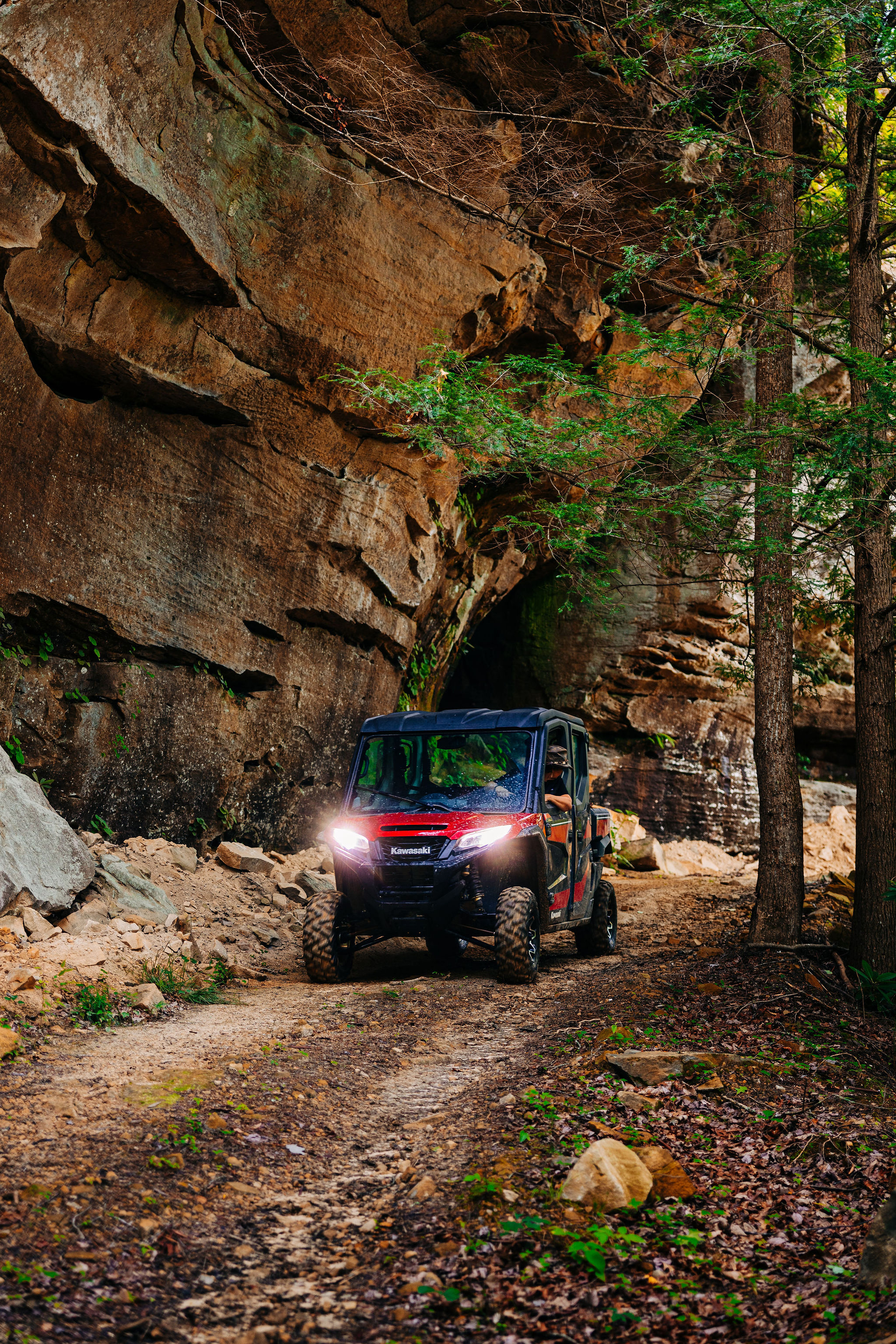 Side-by-side passing under a huge Red River Gorge rock arch