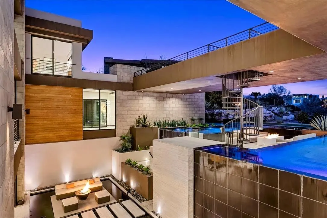 Custom home built in paradise valley with multiple levels, pool, spiral staircase, and multiple outdoor features