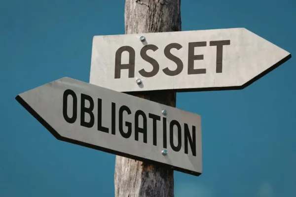 Signpost with two arrows, one labelled Asset and one labelled Obligation.