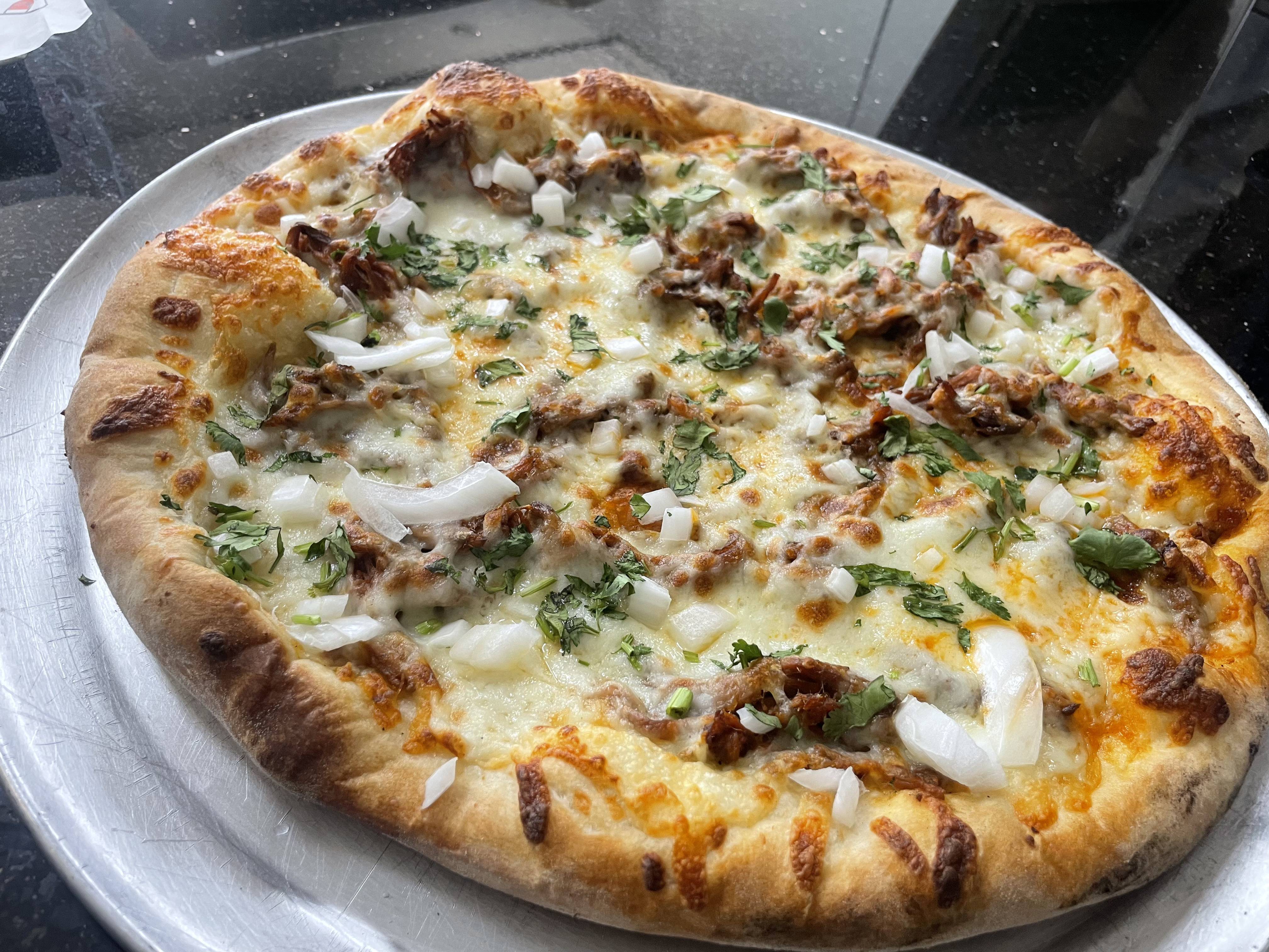 Specialty gourmet pizza — birria and Sicilian at Bert's West Hartford CT