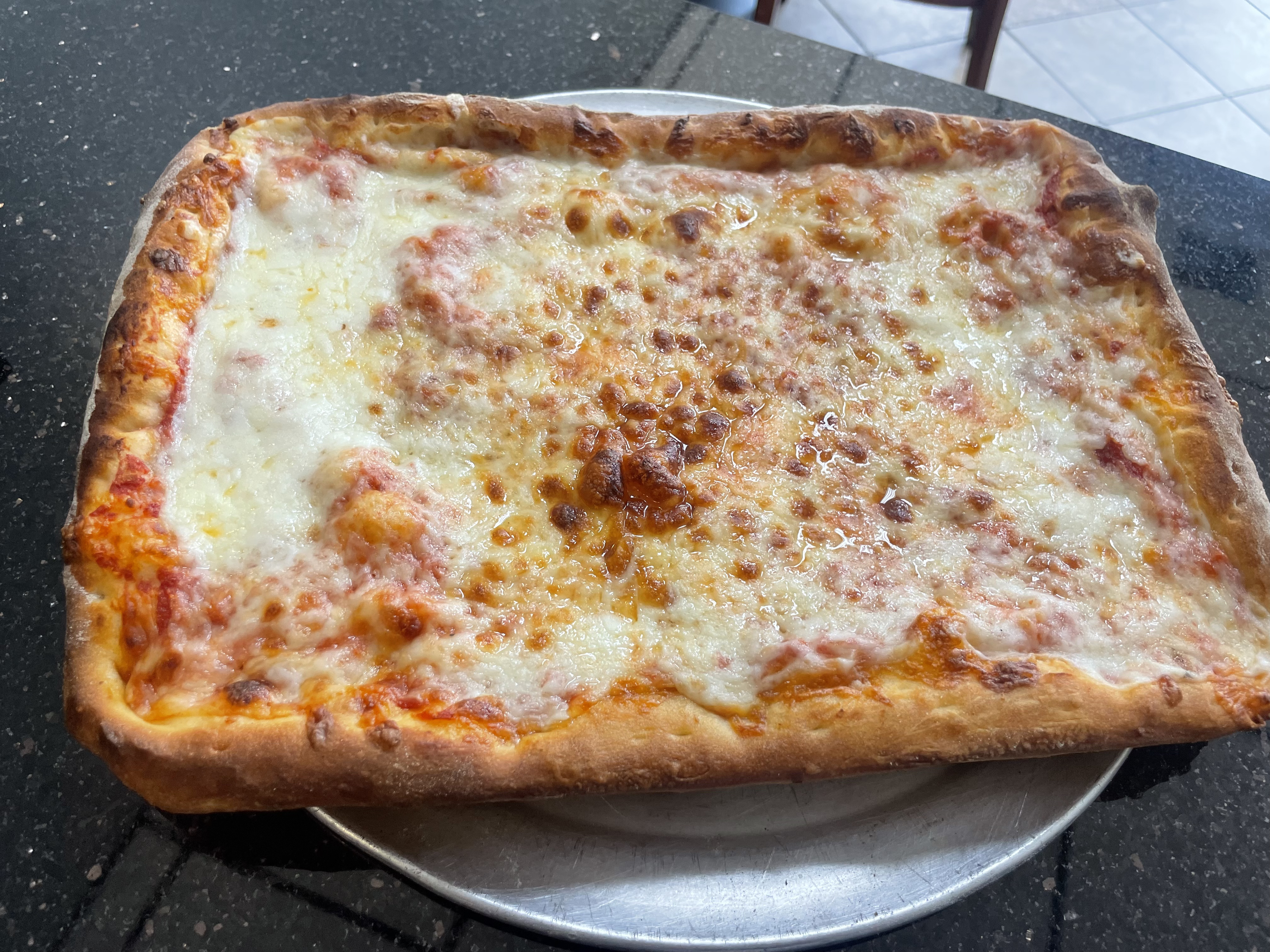 New York style pizza at Bert's Pizzeria West Hartford CT — crispy crust generous toppings