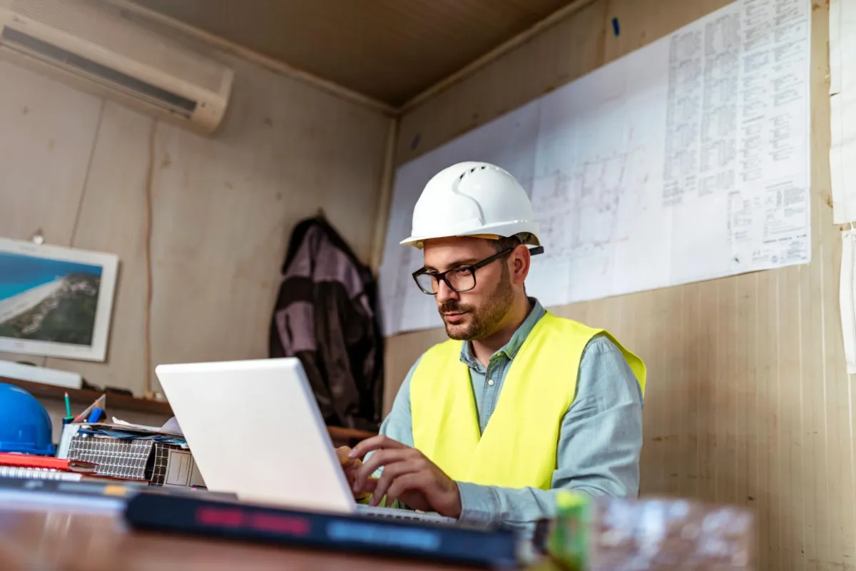 Engineer looking at laptop