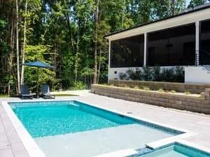 Custom in-ground pool installation in Charlotte NC by AllPhase Exteriors & More