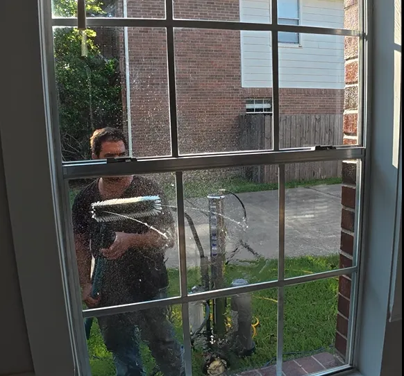a man standing next to a truck with a tarp on it