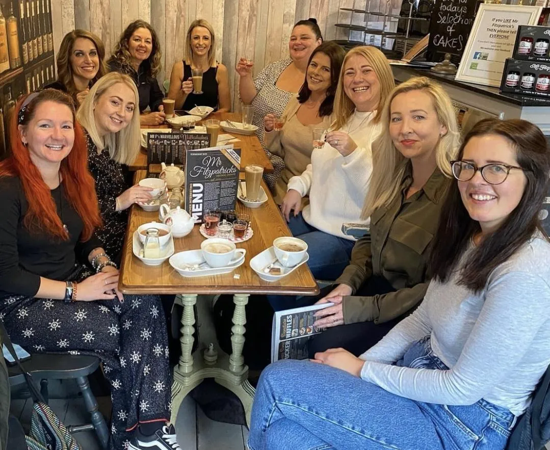 Group of young women at a coffee shop