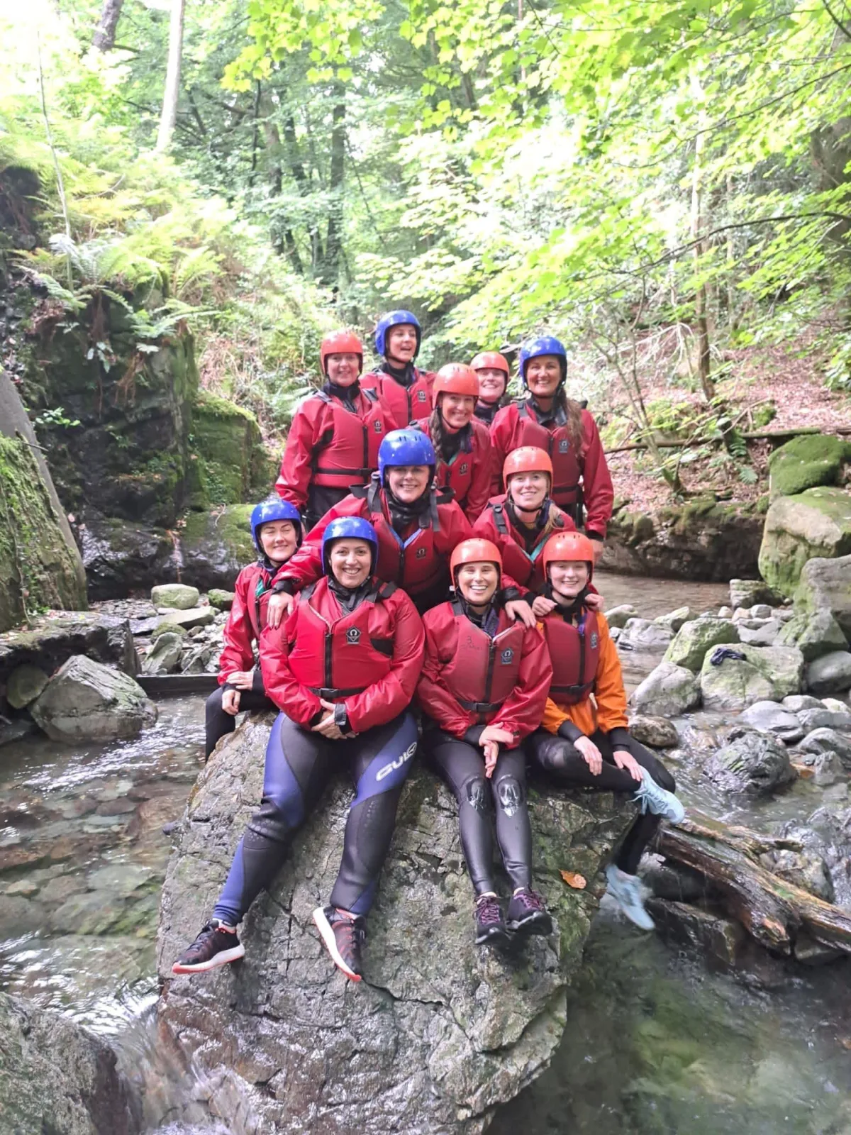 13 people kitted out for gorge scrambling