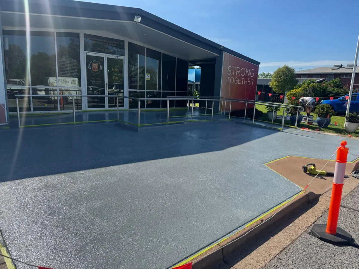 epoxy floor outside red building