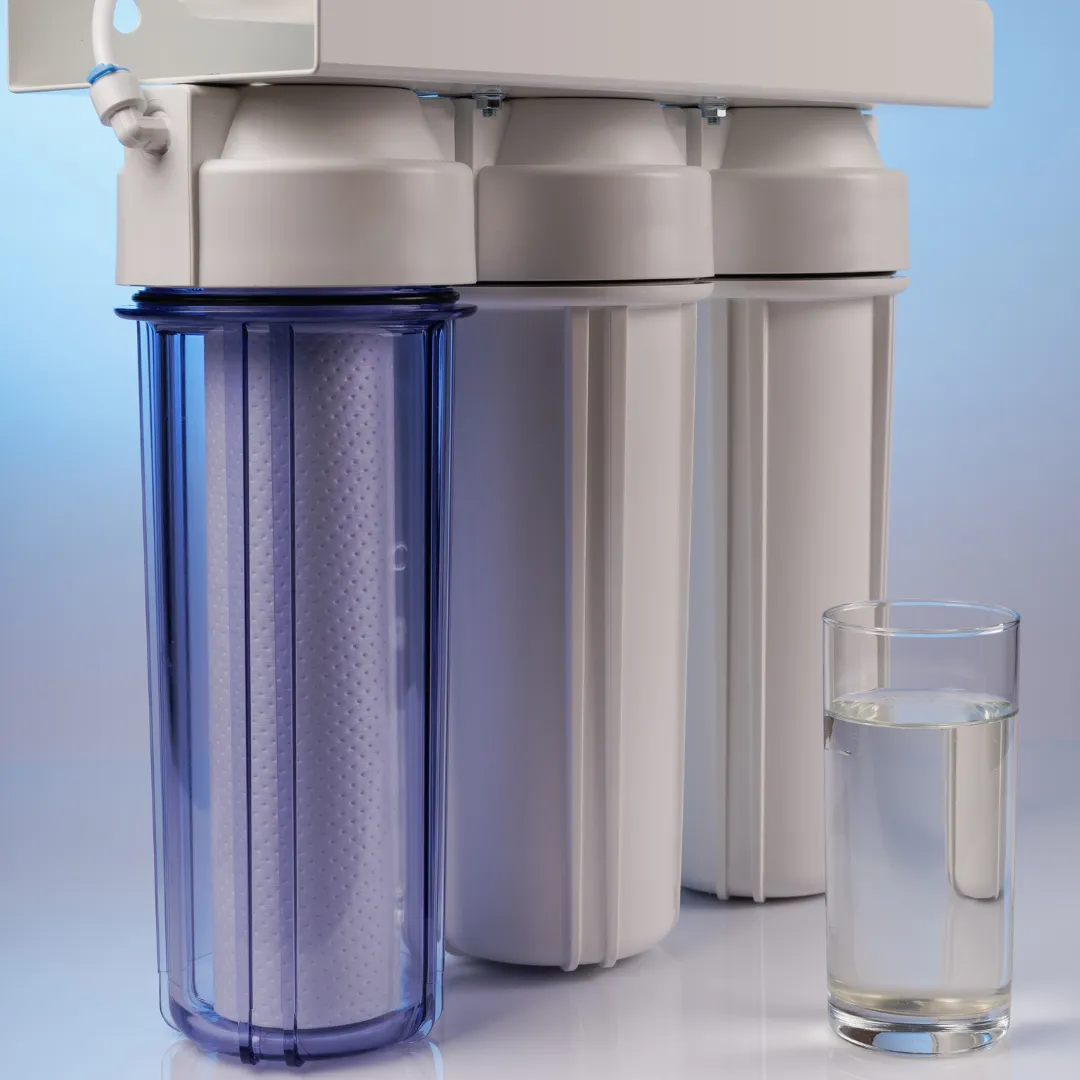 A UV light water disinfectant system being installed to eliminate harmful bacteria and microorganisms from the home's water supply.