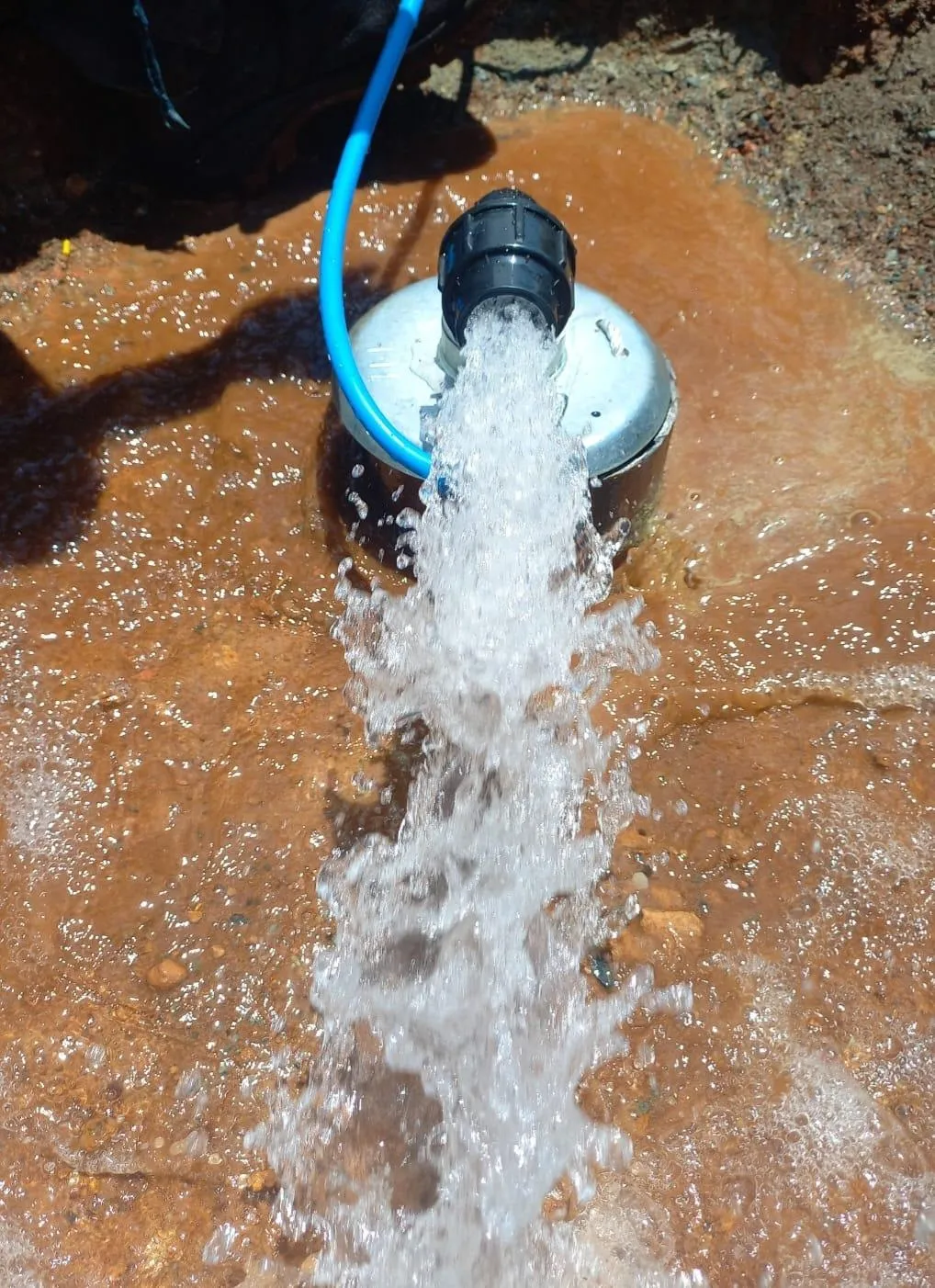 AquaFlow SA technicians working on a borehole installation in South Africa