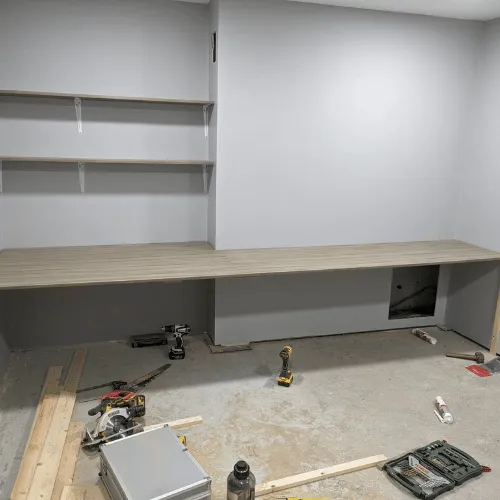 IA Property Solutions skilled joiner working on custom woodwork in Dorset