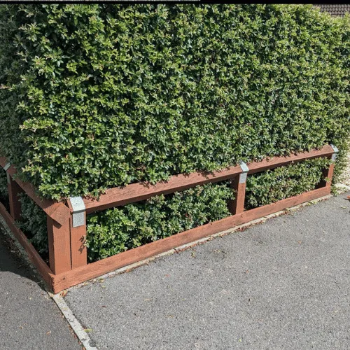Wooden boundary fence and hedge trimming service Dorset