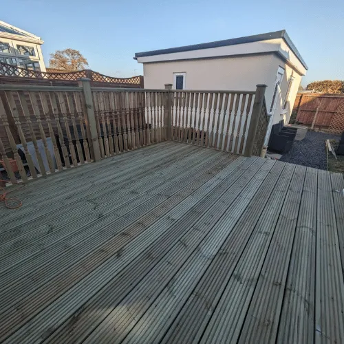 Raised timber decking installation in Bournemouth garden
