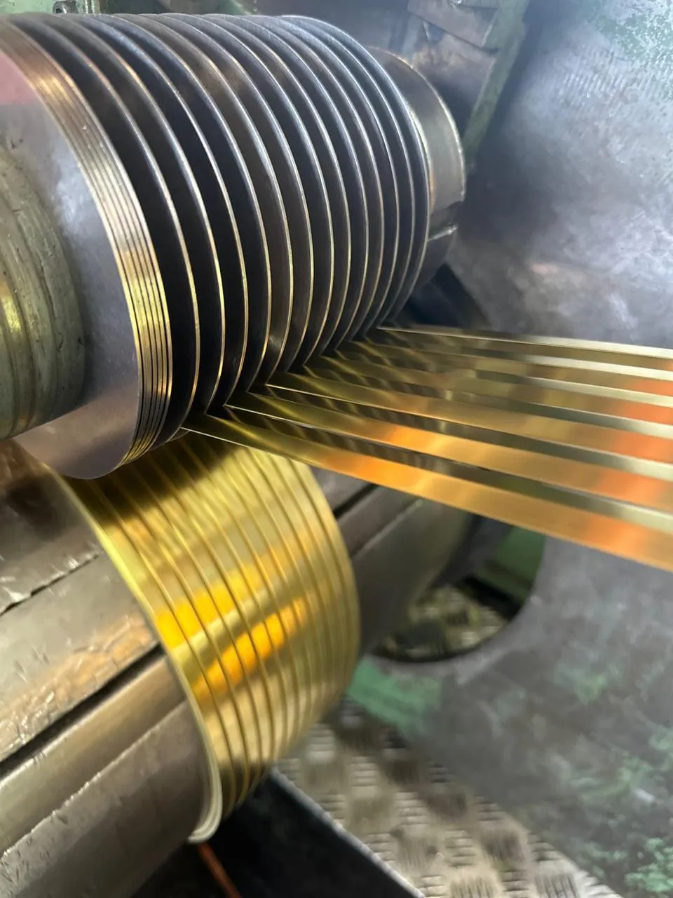 Brass strip C26000 70/30 alloy being processed — precision slit brass strip supplier South Africa | MetaleN