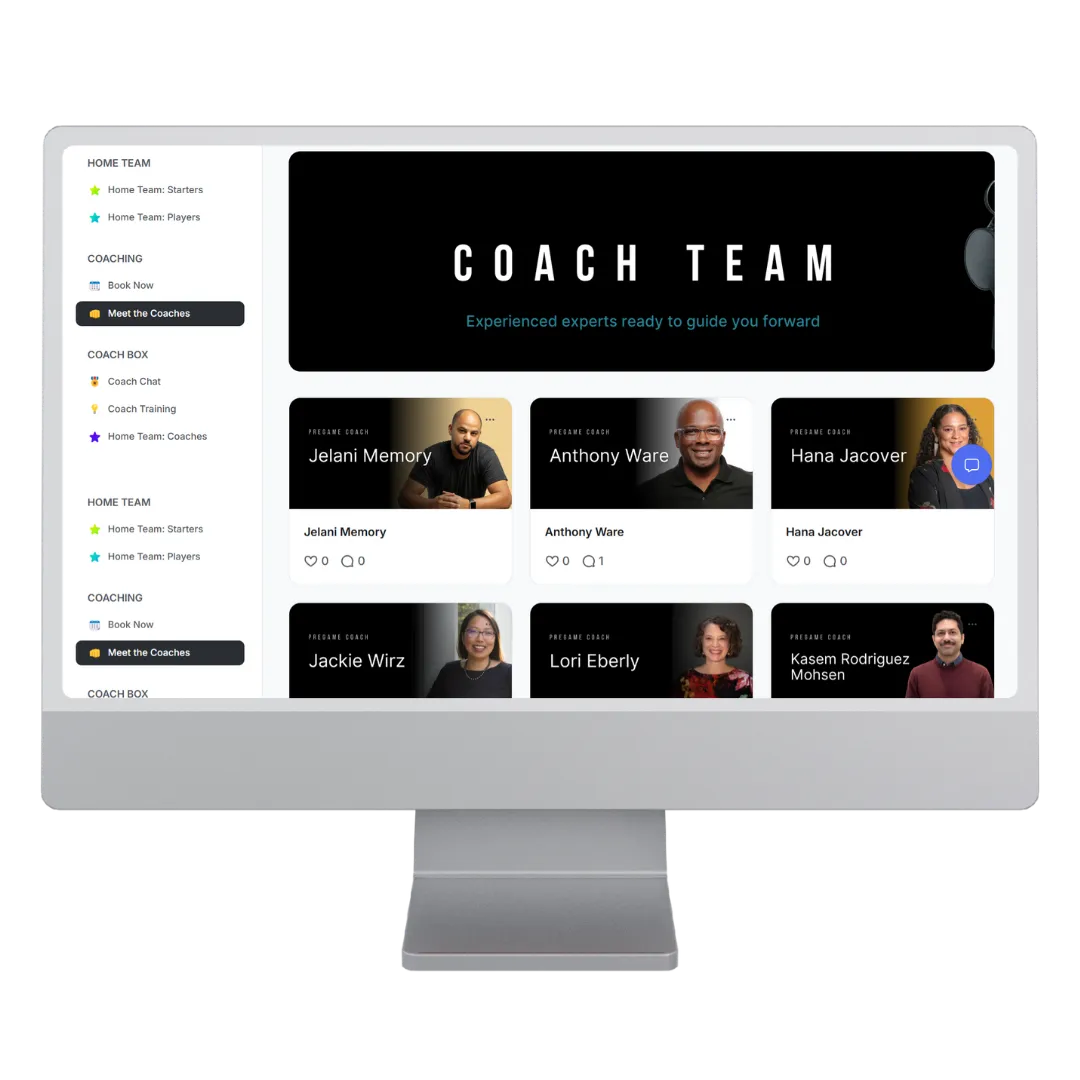 woman in teal t-shirt sitting beside woman in suit jacket