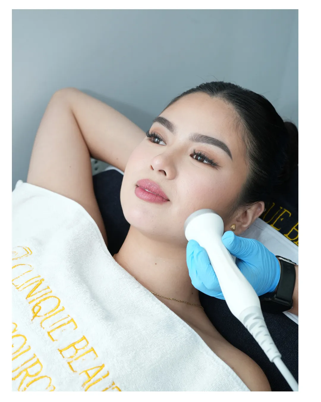 Relaxed client smiling after professional facial and skin care consultation