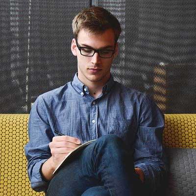Smiling New Zealand electrician prepared for onsite work