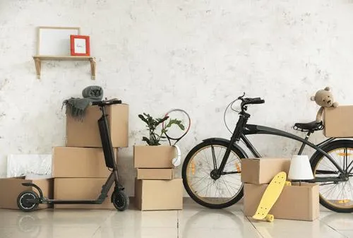A bicycle and moving boxes