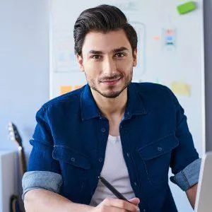 Business professional reviewing homeownership statistics for marketing