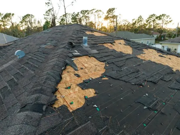 Missing Shingle Roof Damage - Roofing Service Emergency Example