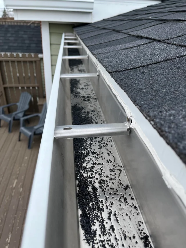 Hole in Roof Damage - Roofing Service Emergency Example