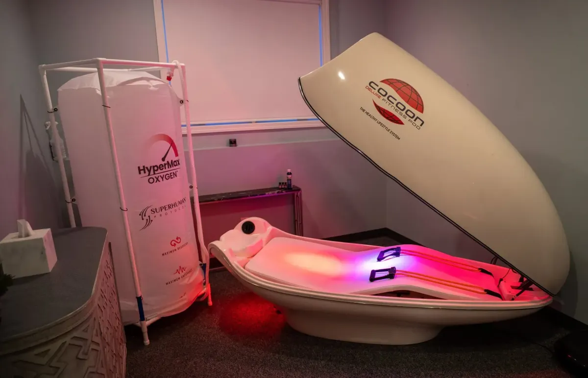 brown glass bottle on brown wooden table