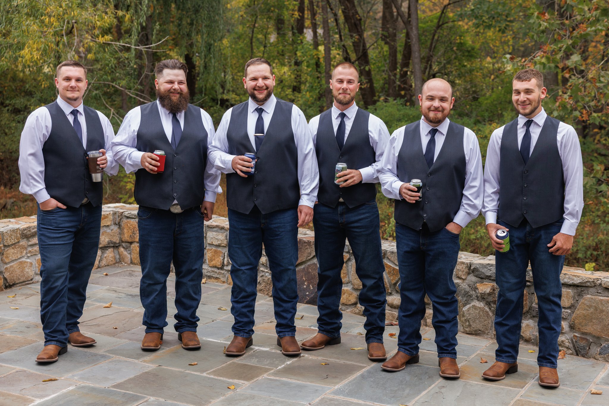 Groomsmen enjoying a drink together before the wedding ceremony - Gangi Photography