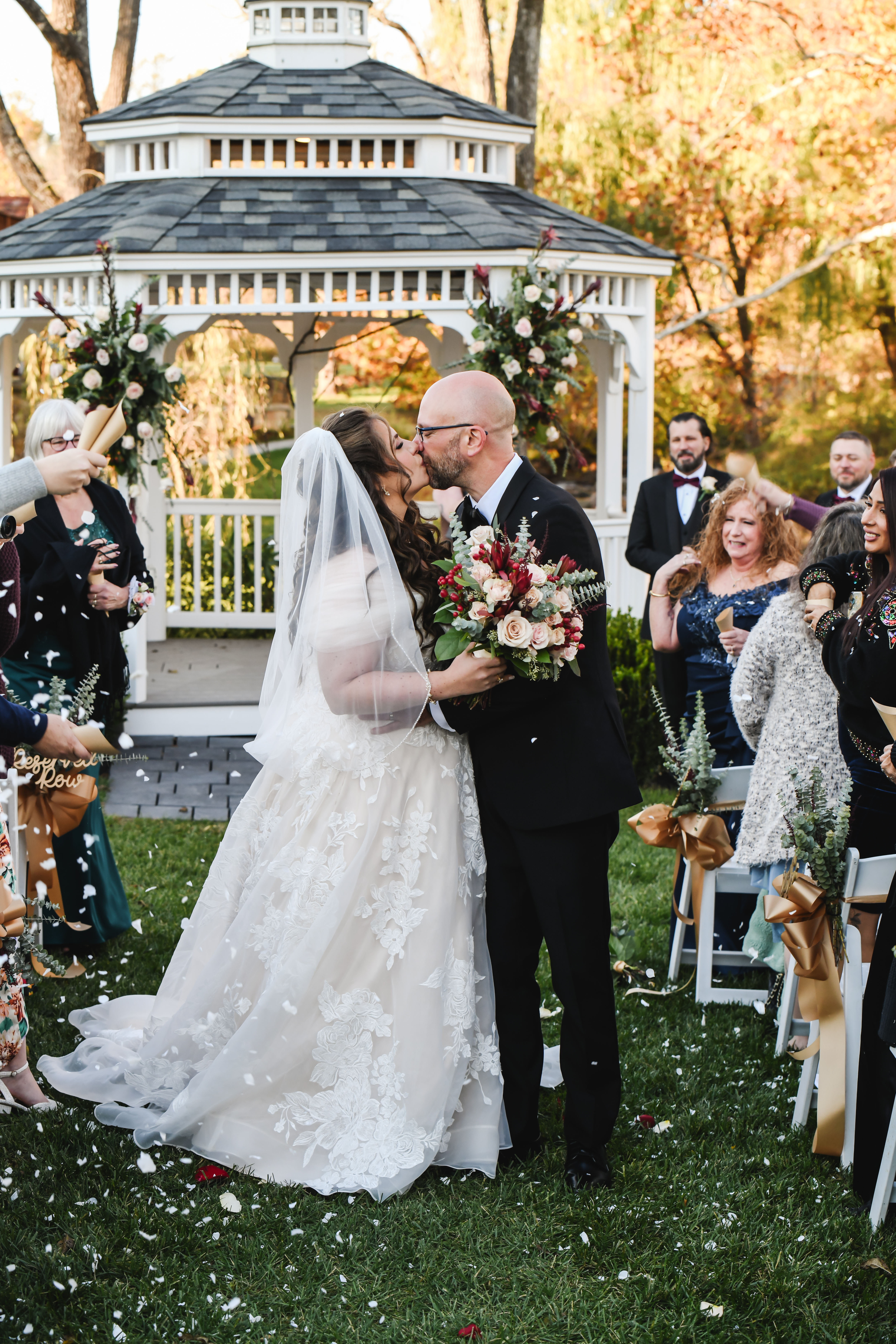 Bride and groom getting married surrounded by loved ones - Little Wing Photography