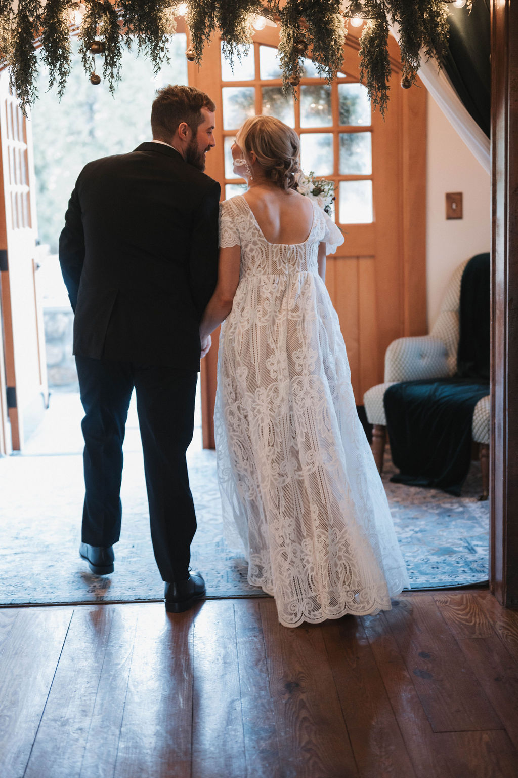 Candid moment between the couple during their wedding day- Portraits by Shannon Moriah