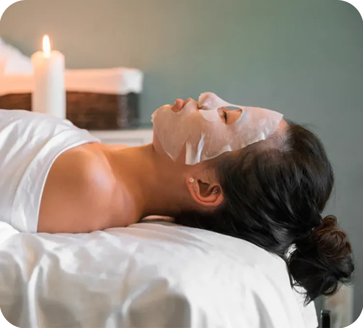 Skin Necessities Woman relaxing on table