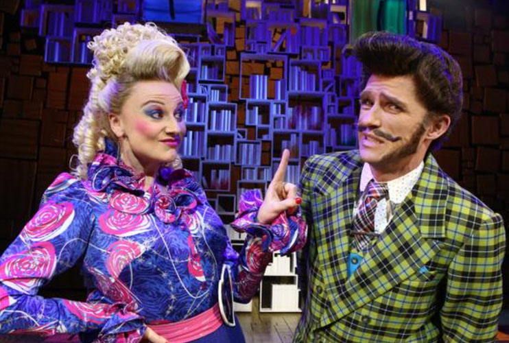 brown wooden book shelves in library