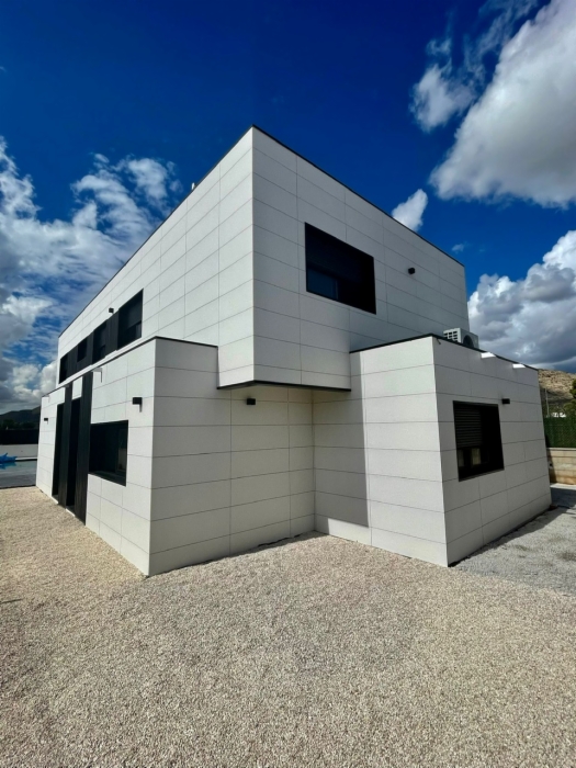 Vista panorámica principal de la vivienda Adeje integrada en la topografía volcánica