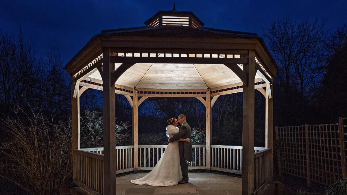 Beautiful landscaped gardens set up for an outdoor wedding ceremony