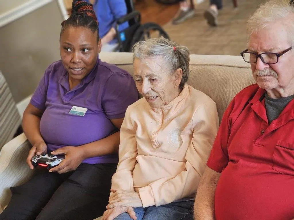 staff working with memory care patient