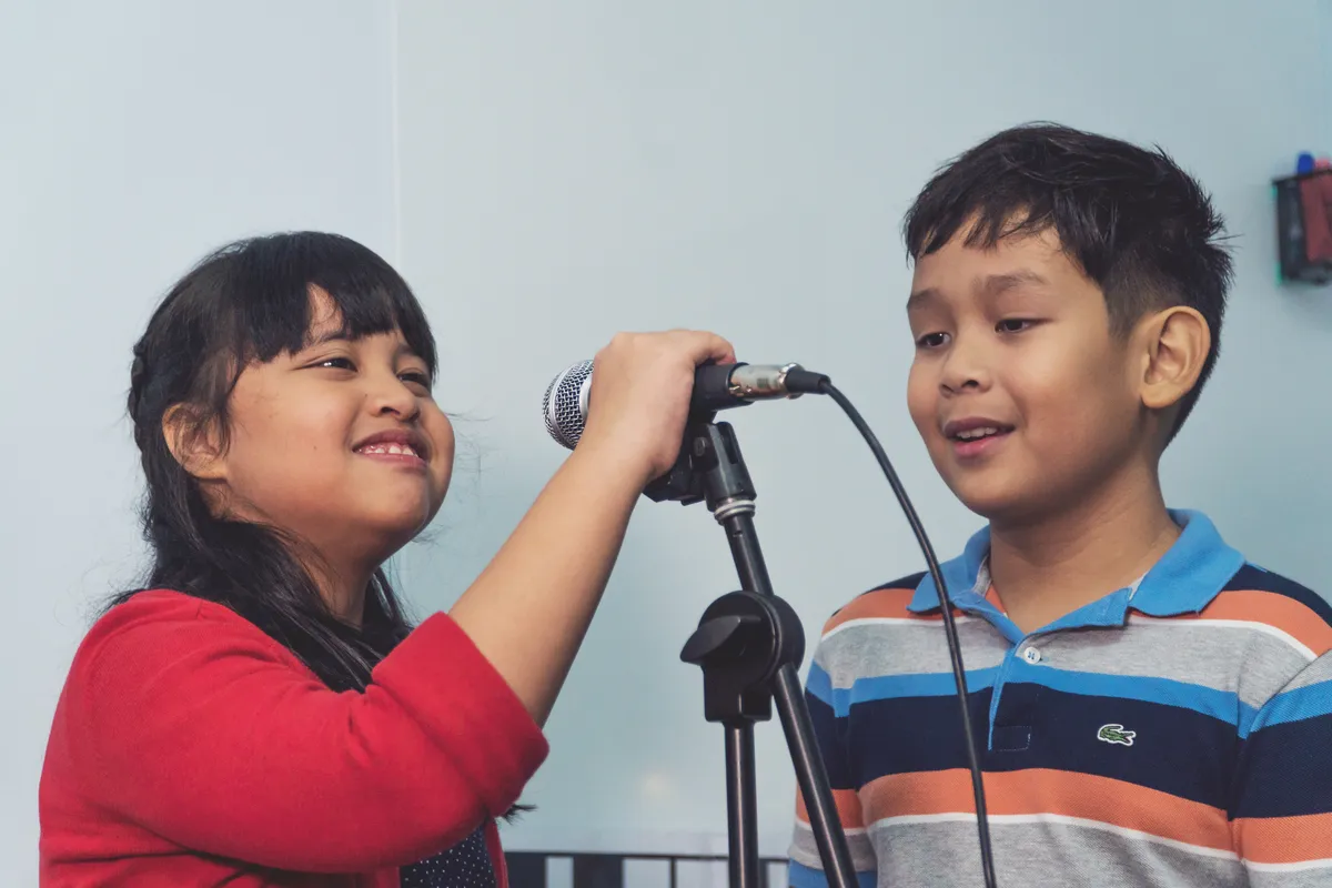 Student receiving vocal coaching during a vocal lesson
