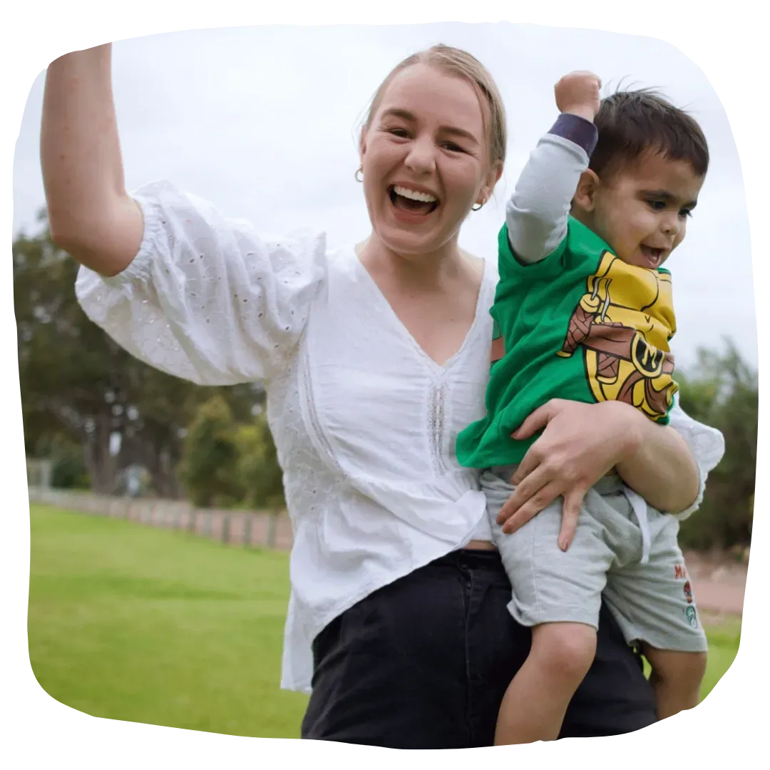 Paediatric Physiotherapist Celebrating a Milestone with Child