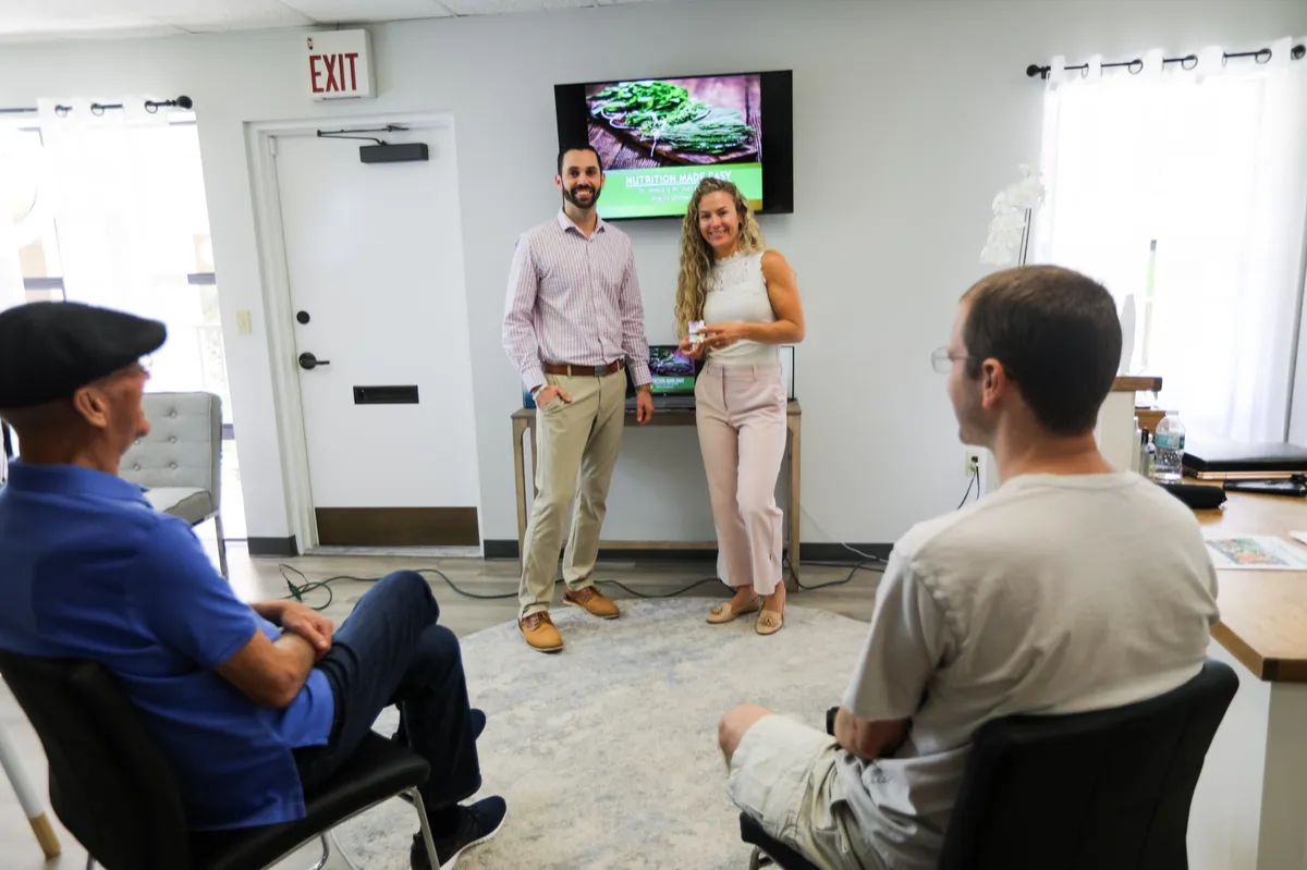 Vitality Chiropractic doctors leading the friendly New Patient Orientation Class in Sarasota
