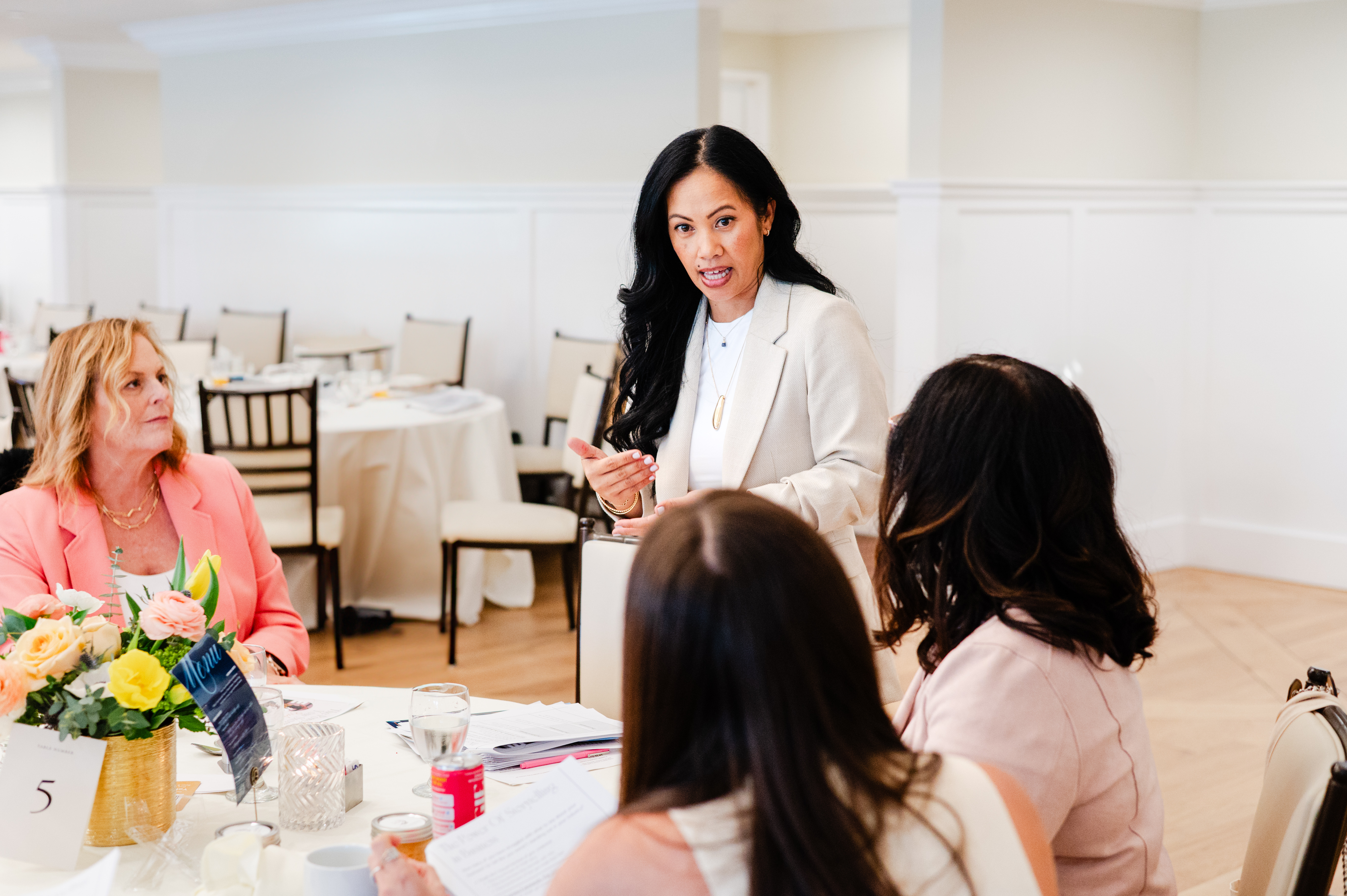 Layered editorial collage of a confident speaker and studio portraits.