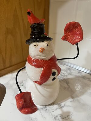 Snowman with mittens and cardinal