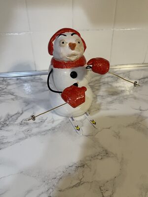 Snowman skiing