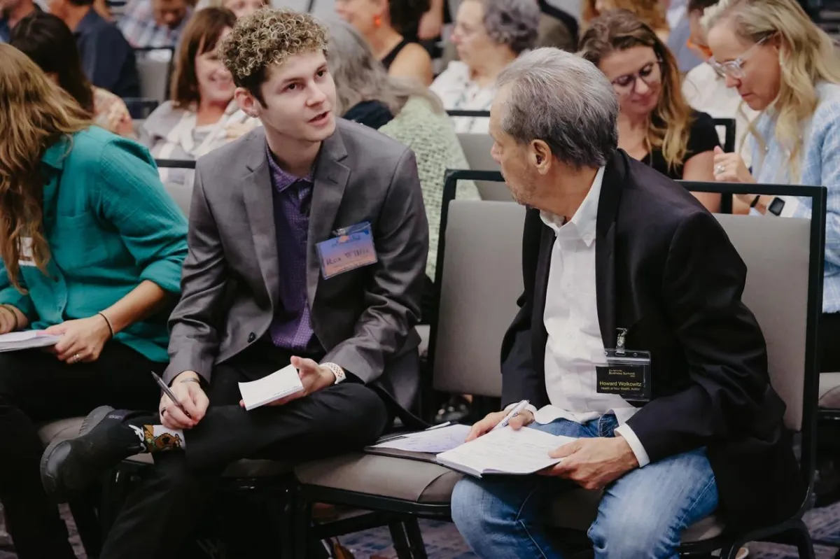 Asheville Business Summit attendees networking