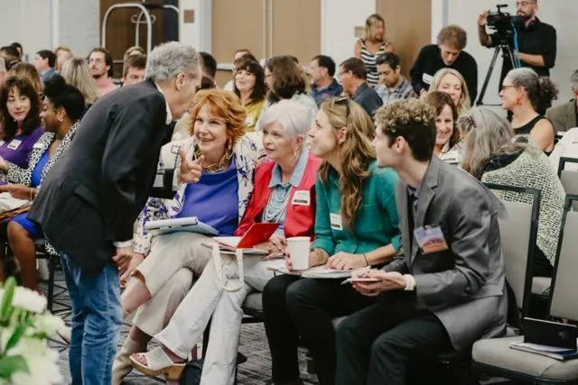 Business Summit attendees networking