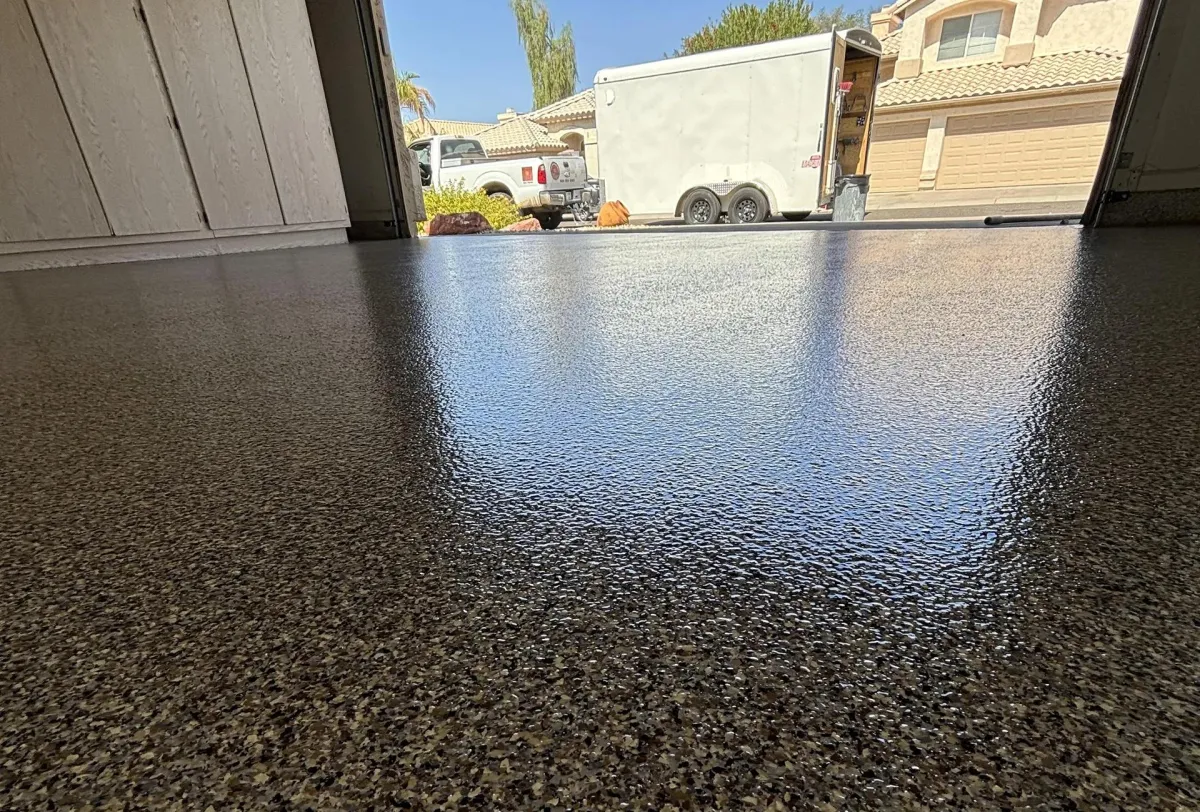 Decorative flake epoxy garage floor coating with textured non-slip finish