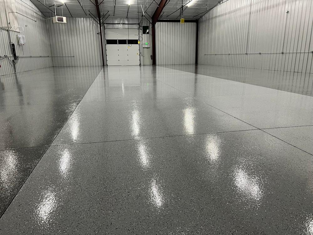 Large commercial warehouse with high-gloss epoxy floor coating