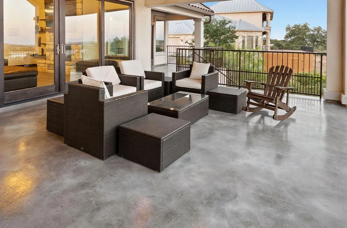 Outdoor patio with concrete coating and seating area